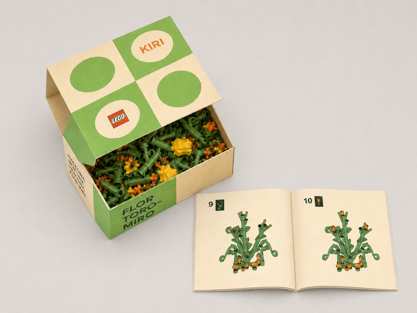 Caja verde de Kiri abierta con las flores de LEGO y el folleto